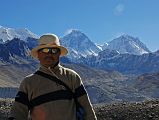 Gokyo 5 Scoundrels View 7 Guide Gyan Tamang With Everest, Lhotse, Nuptse Behind My guide Gyan Tamang poses at Scoundrels View with Everest, Lhotse, and Nuptse behind.